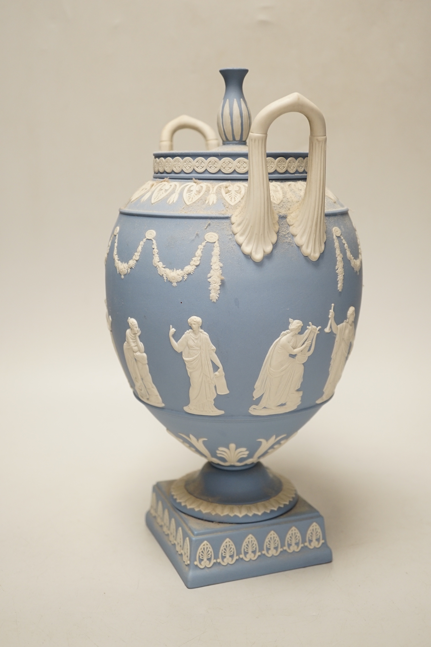 A 20th century Wedgwood blue Jasper two-handled urn and cover, 31cm